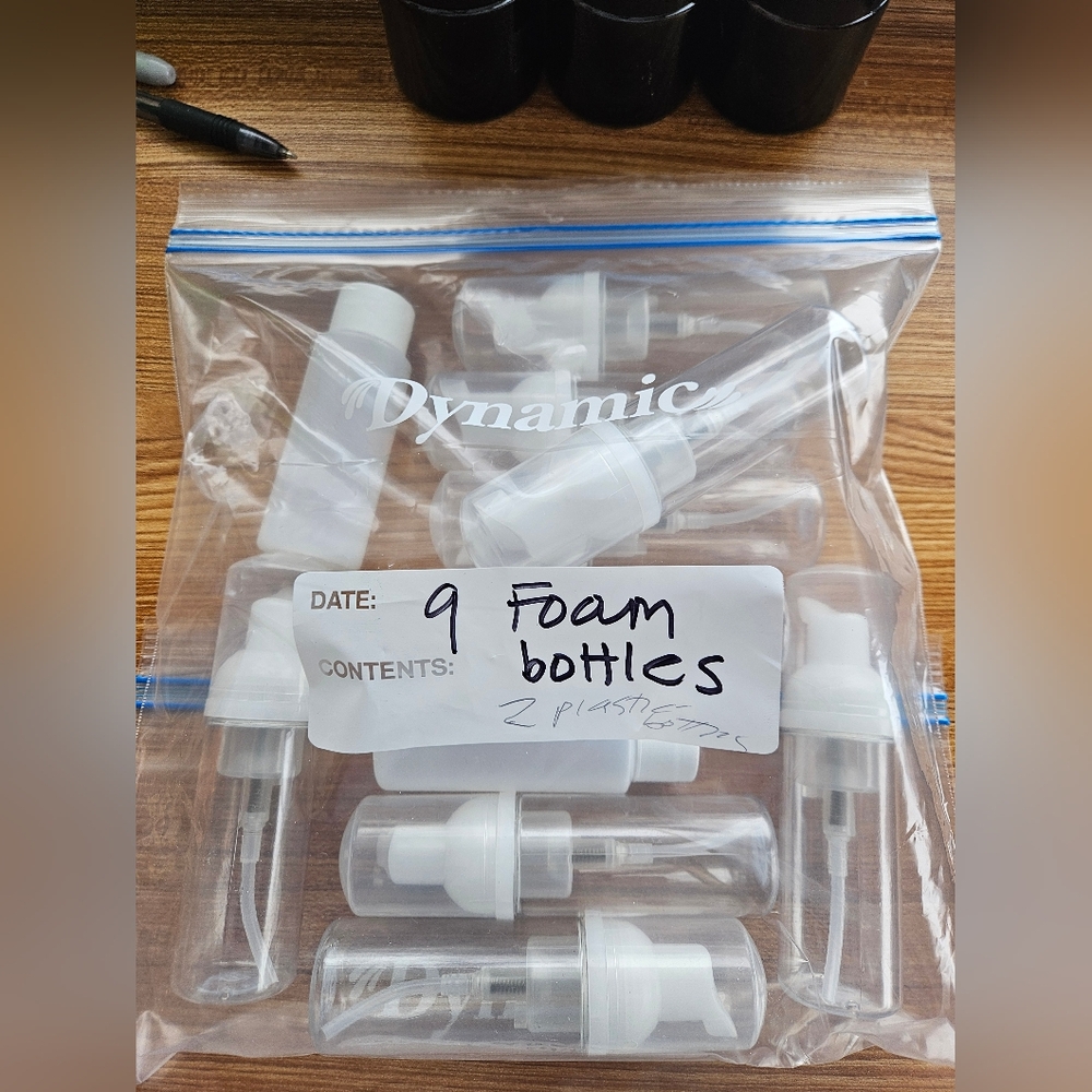9 empty foam plastic bottles and 2 round plastic bottles.